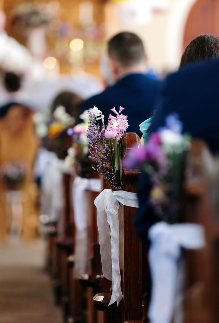 Olivias Flowers people sitting at church
