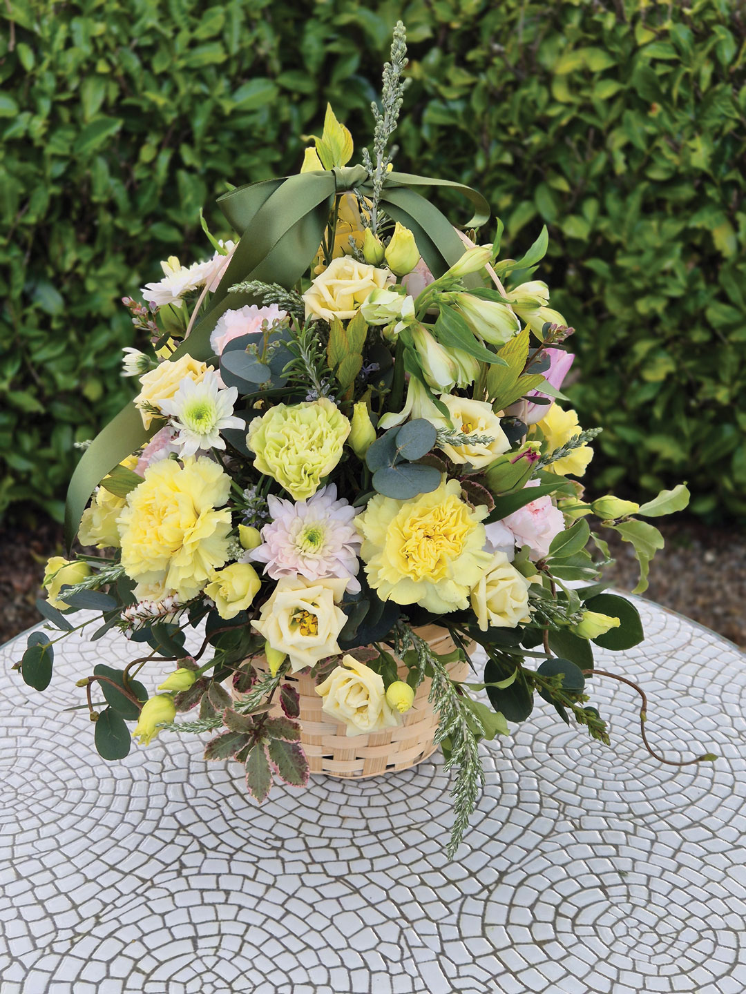 Olivias Flowers arrangement in basket